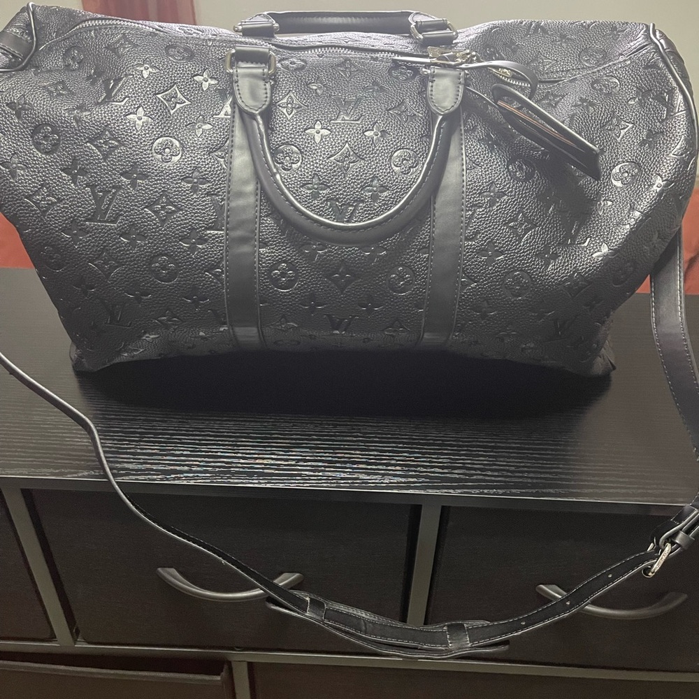 Elegant Black Embossed Men's Duffel Bag